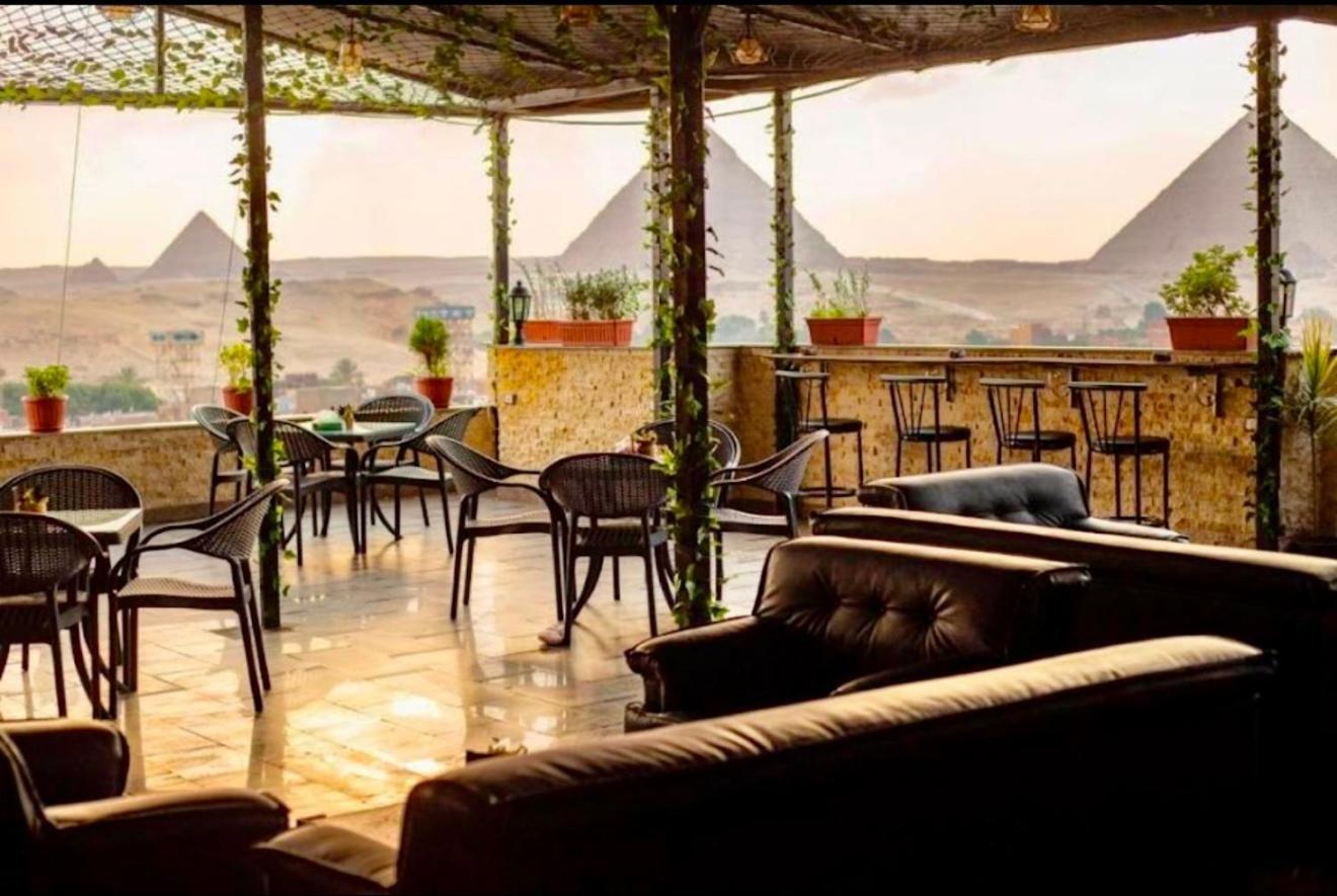 Topaz Pyramids View Inn Kafret el-Gabal Exterior foto