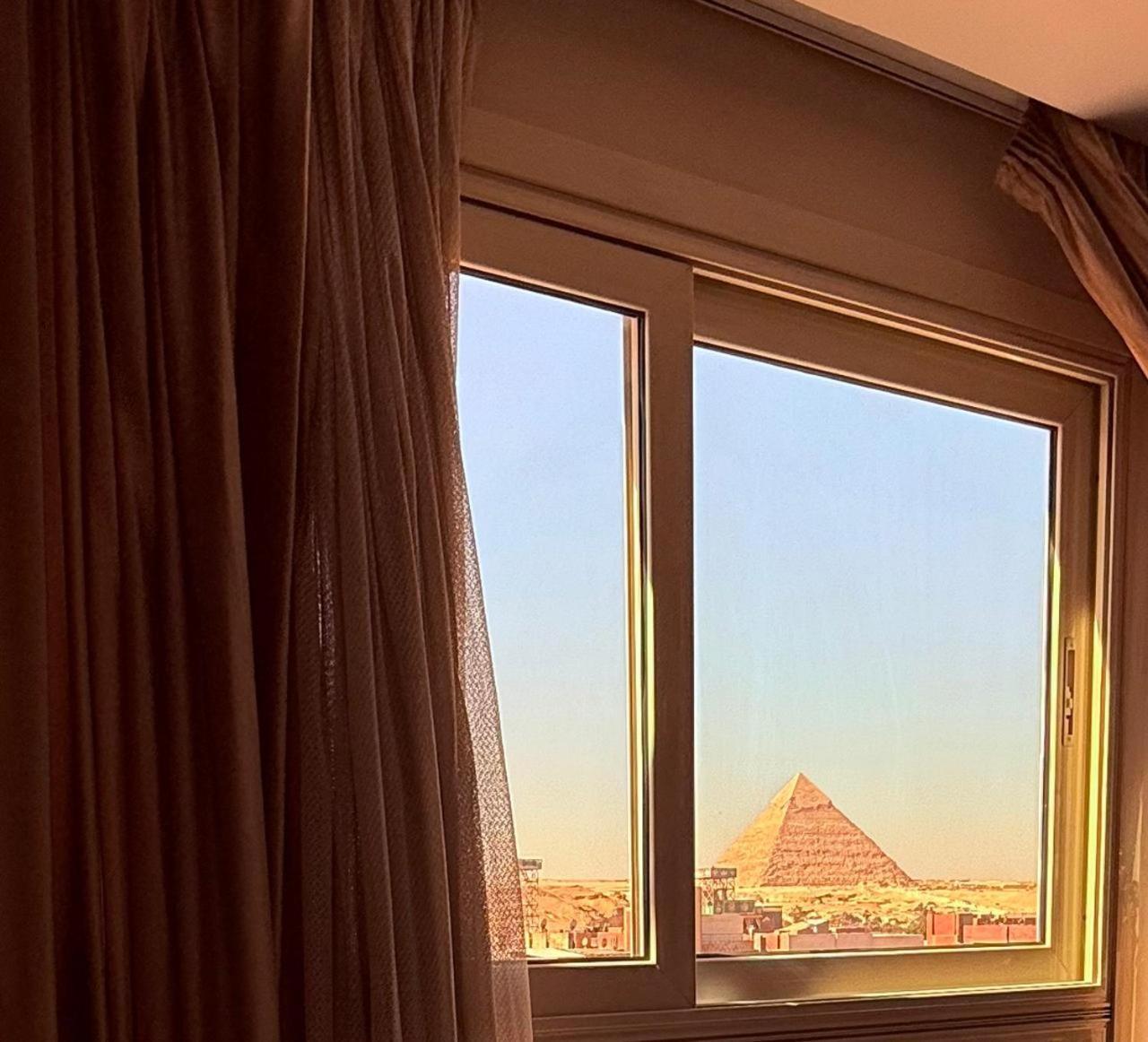 Topaz Pyramids View Inn Kafret el-Gabal Exterior foto