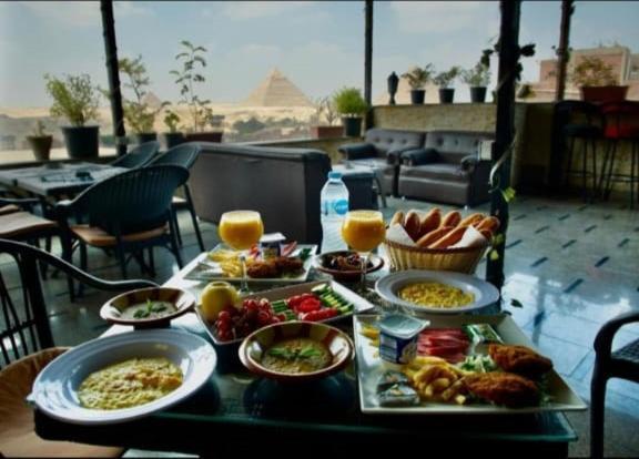 Topaz Pyramids View Inn Kafret el-Gabal Exterior foto