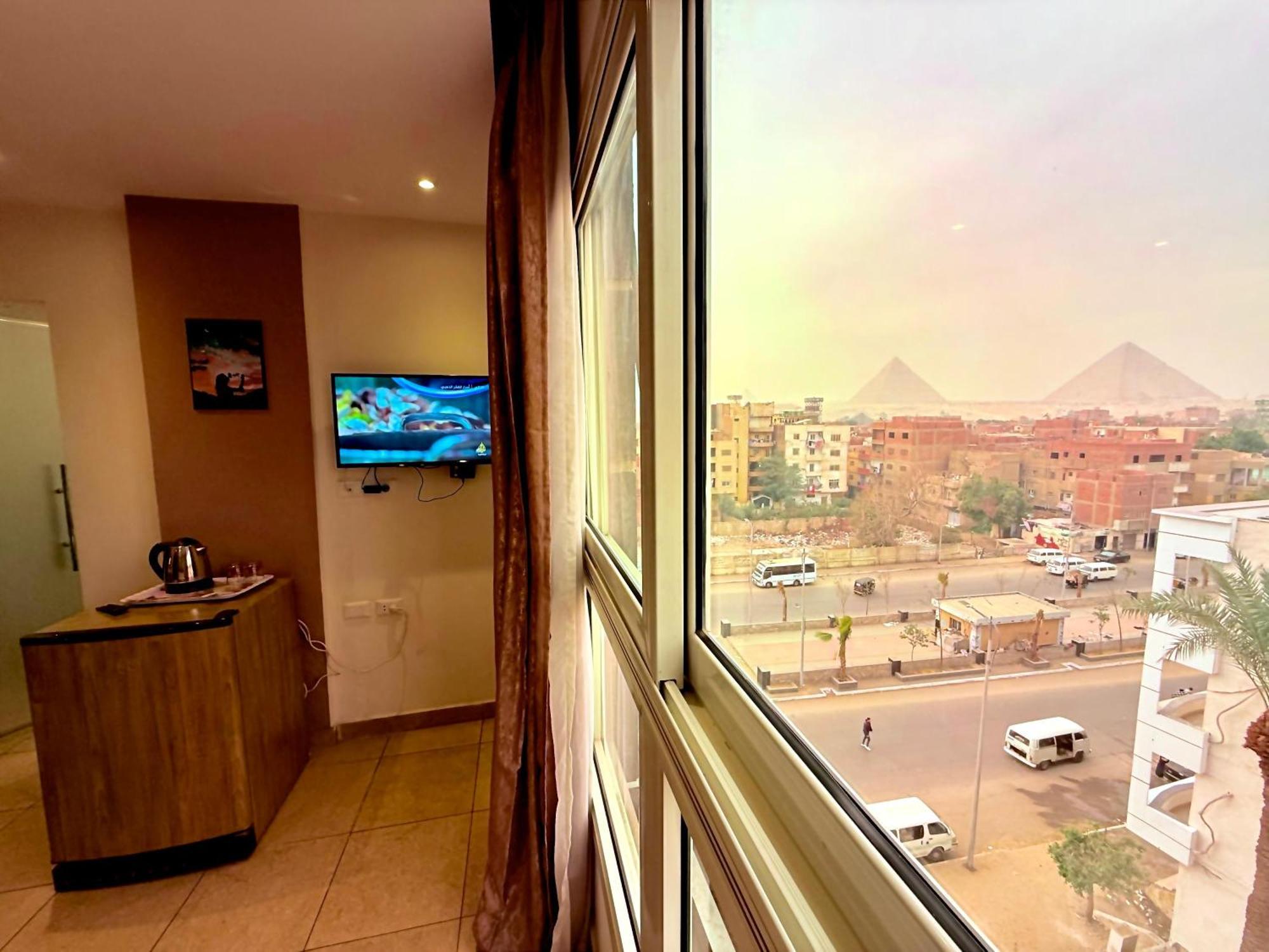 Topaz Pyramids View Inn Kafret el-Gabal Exterior foto